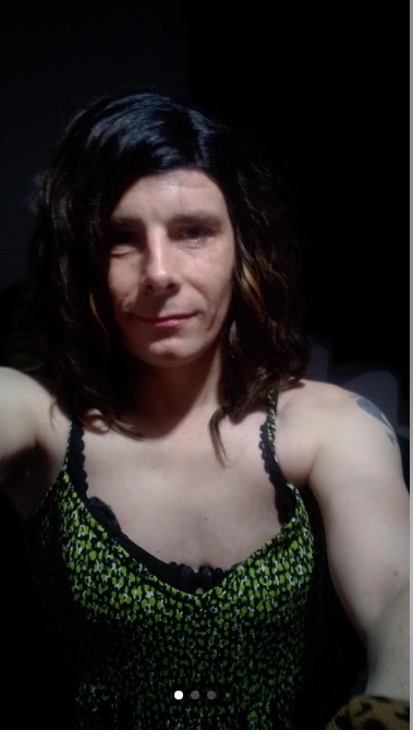 Aveline Marlowe crossdresser wearing a green top