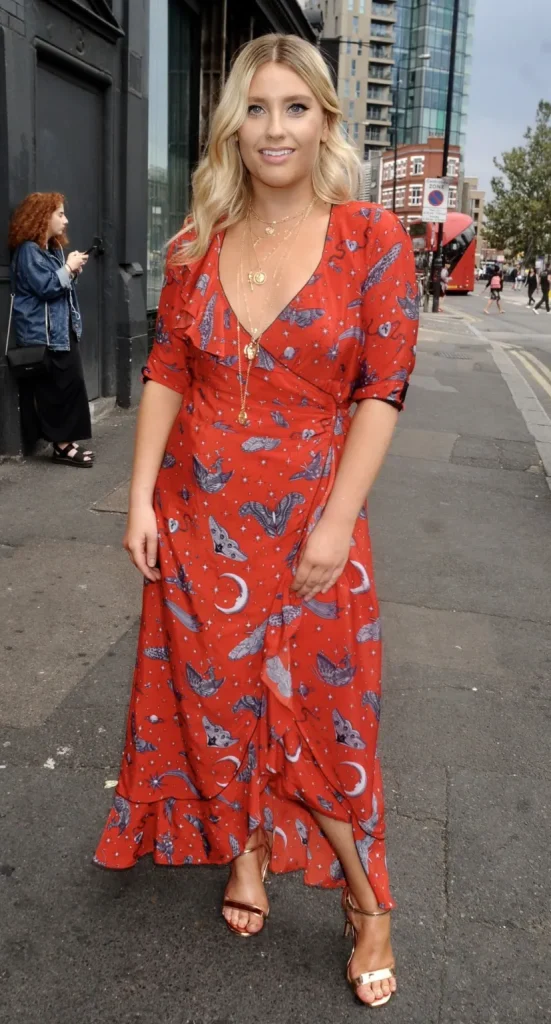 ella henderson wears a red maxi dress