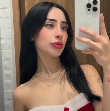 evelyn sanchez wears a red dress