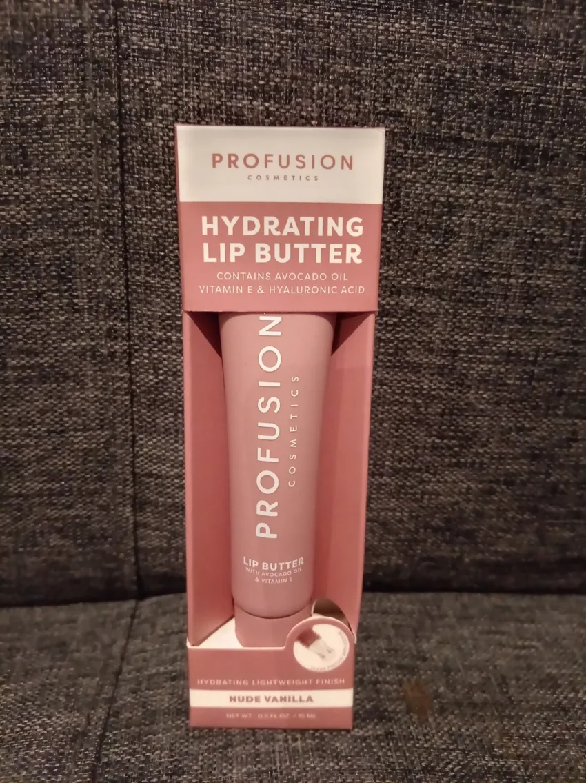 a tube of profusion hydrating lip butter against a dark background